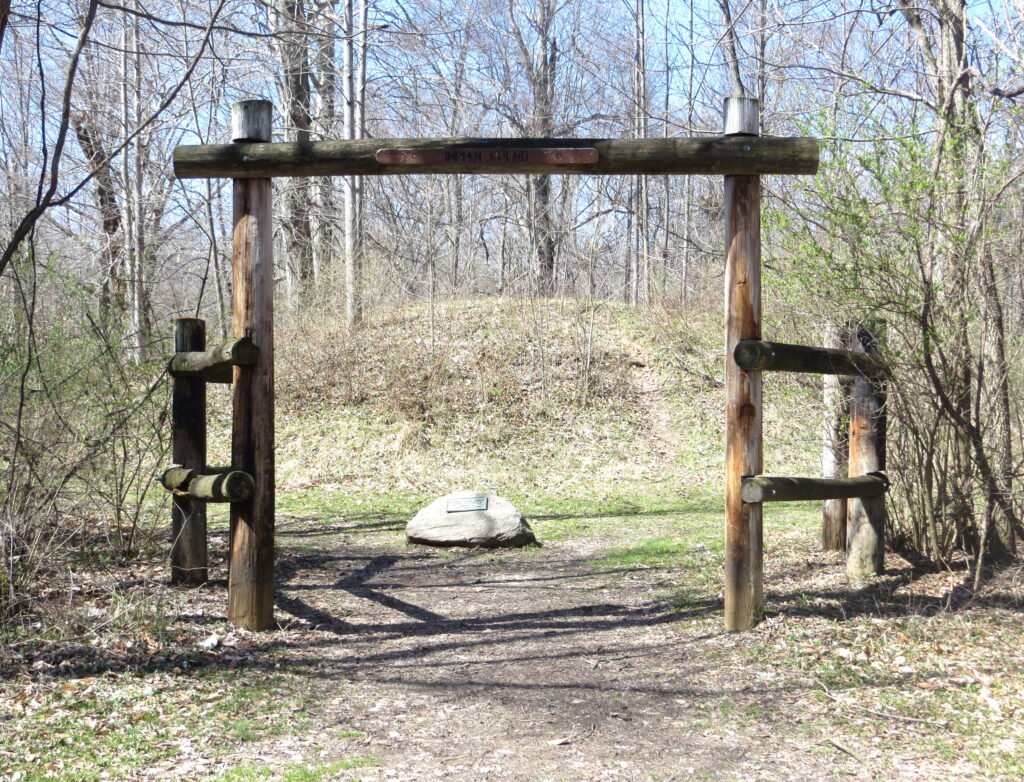 Hueston Woods low flat mound entrance posts boots on the ground botg for There's Treasure Inside
